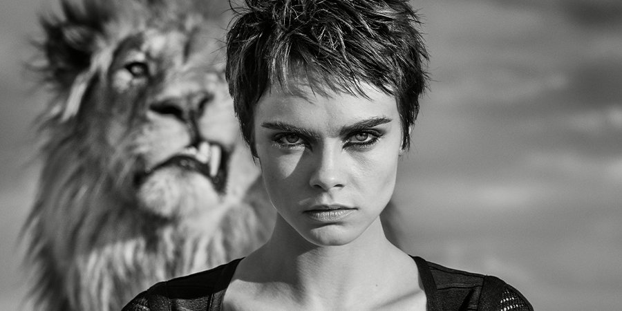Cara Delevingne with a lion photo for TAG Heuer Campaign