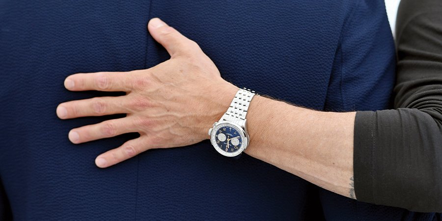 Brad Pitt sporting a Premier B01 Chronograph 42 by Breitling watches
