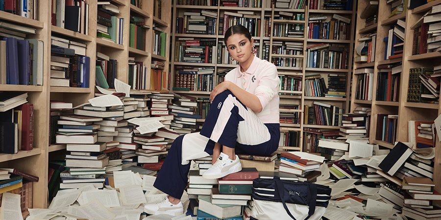 Selena Gomez wearing the SG x PUMA collection books