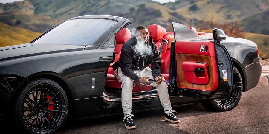 Dashon Goldson, a Rolls Royce and a cigar