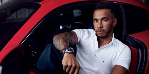 Formula One World Champion Lewis Hamilton Global ambassador for Tommy Hilfiger Mens cover in a red car