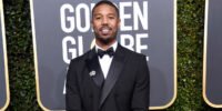 Michael B Jordan at Golden Globes wearing Burberry cover