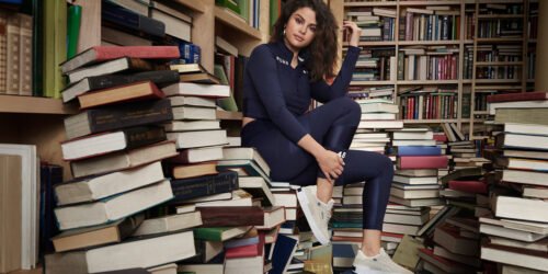 Selena Gomez wearing the SG x PUMA collection cover books